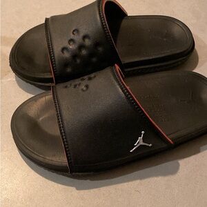 Jordan Black Slide Sandals with Red Trim and Silver Logo